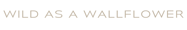 Text 'Wild as a Wallflower' in a decorative font on a white background
